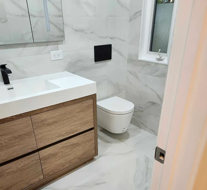 Clean modern bathroom update with new vanity and tile in Rosedale, MD